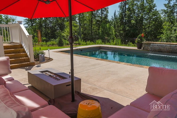 luxury swimming pool with custom waterfall feature