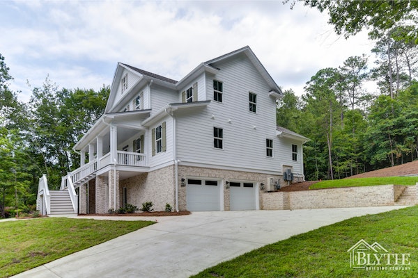 Exterior view of 3-Story Multigenerational Home With Split Front Staircase To Porch And Double Car Garage In Basement