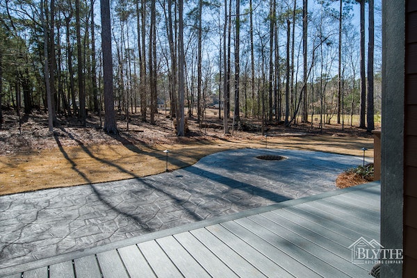 Composite Deck And Stamped Concrete Patio With Sunken Fire Pit