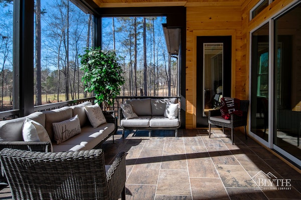 Pine shiplap siding on a screened-in back porch