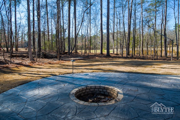Stamped Concrete Patio With Custom Sunken Fire Pit